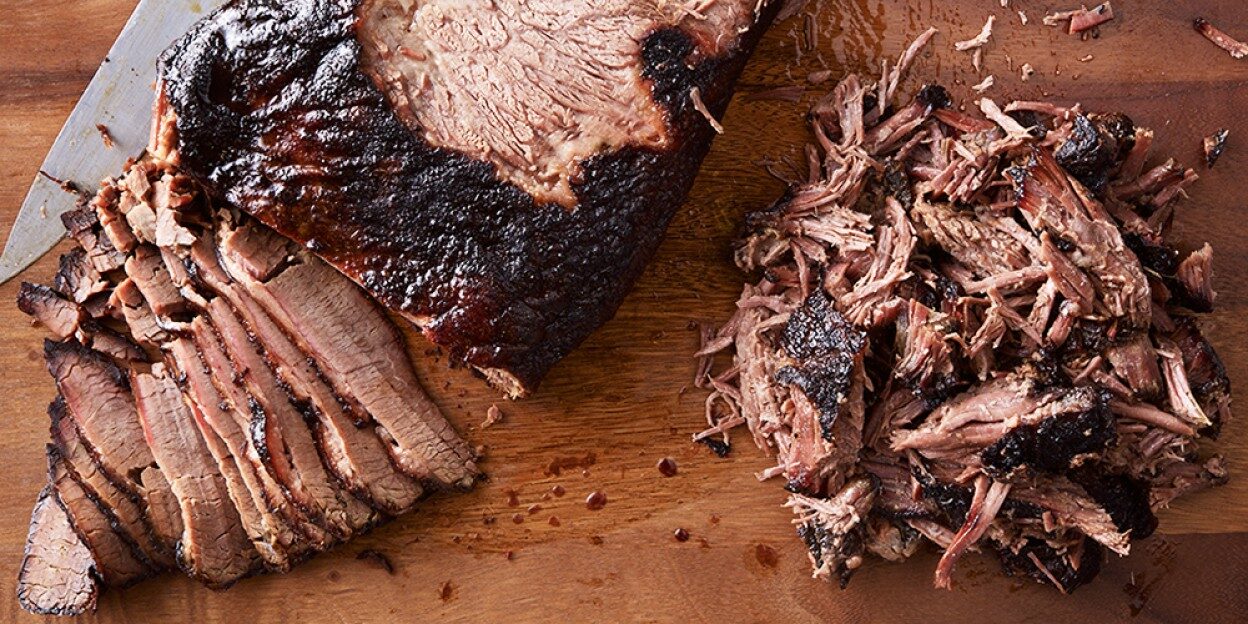 Piles of sliced and pulled brisket